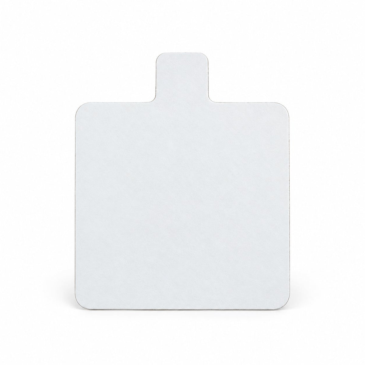 White individual pastry boards in triangular, square, round and cigar shapes