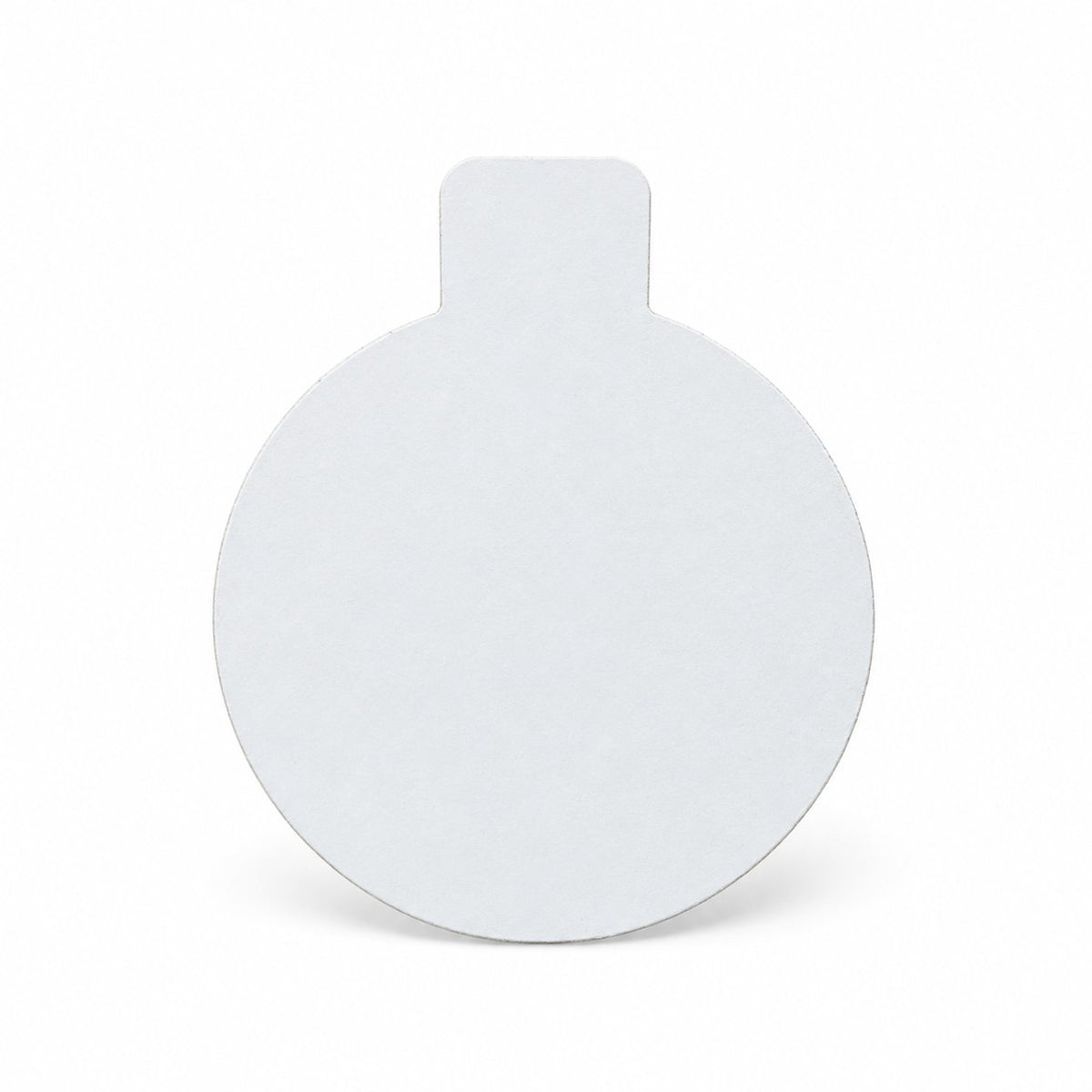 White individual pastry boards in triangular, square, round and cigar shapes