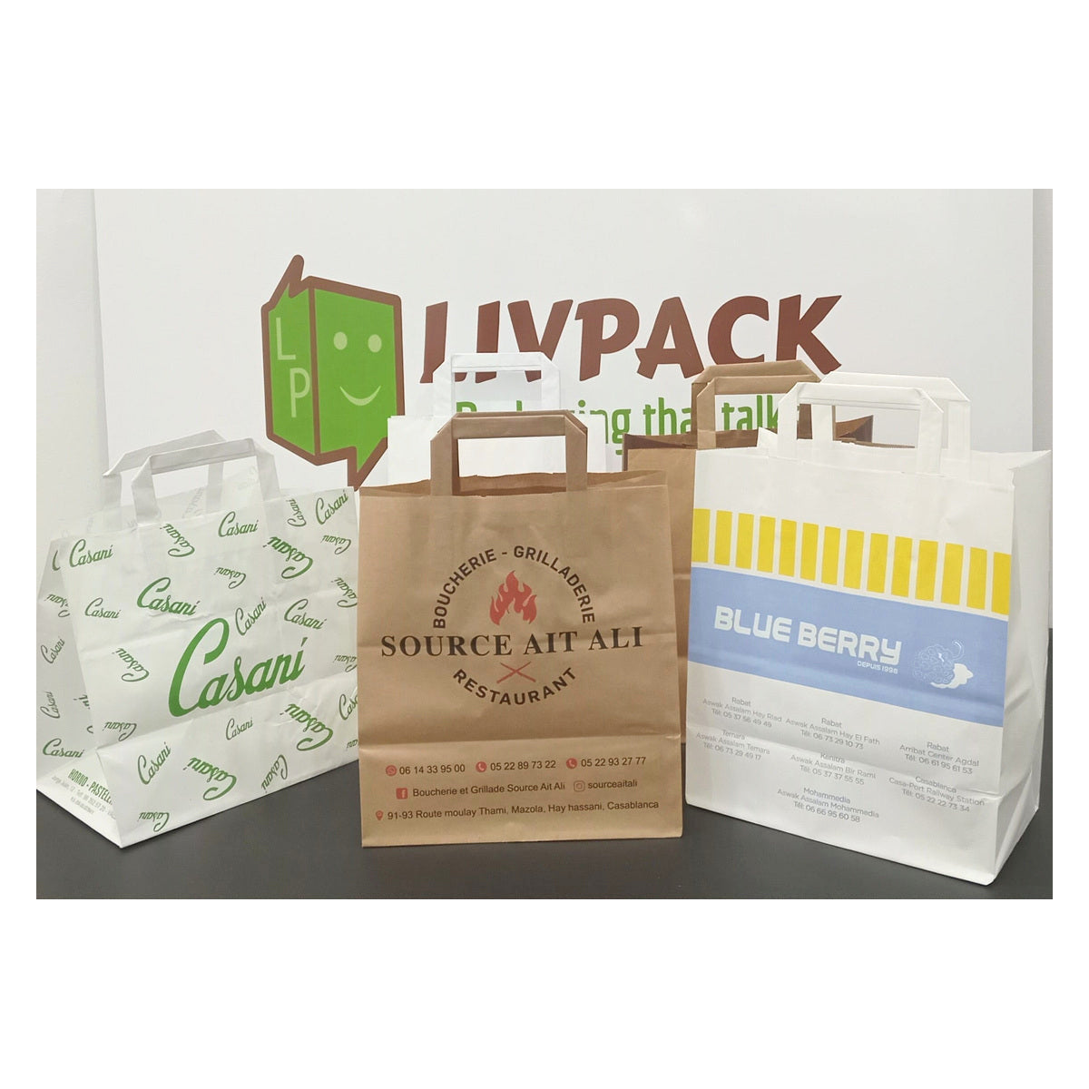 Custom brown and white kraft carrier bags with handles