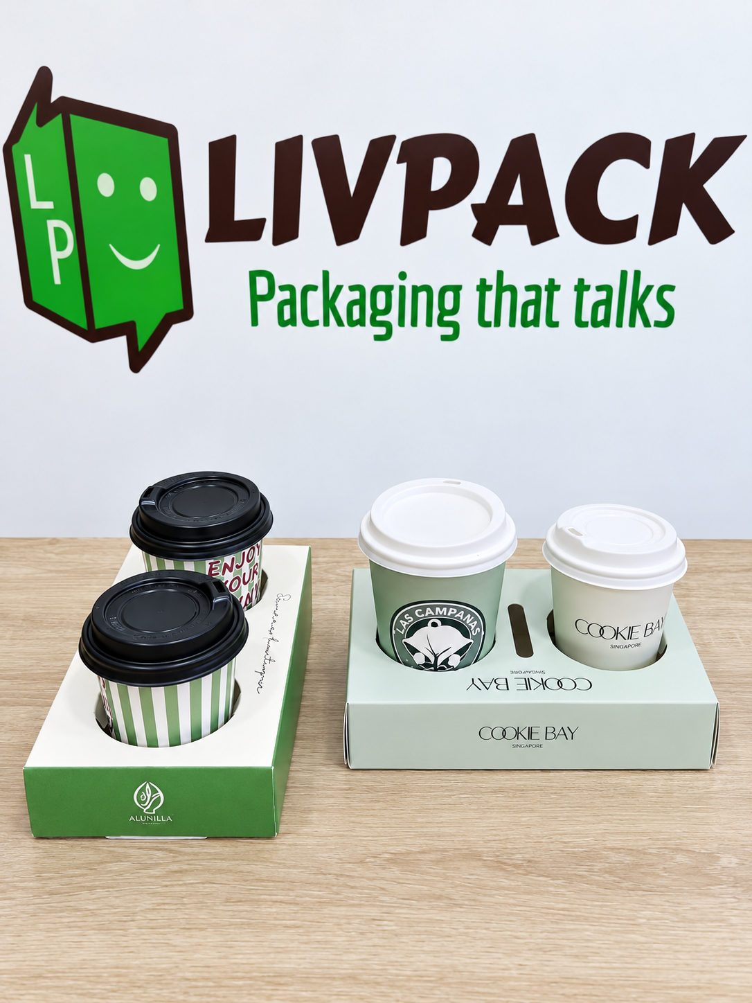 Boîtes porte-gobelets Livpack avec boissons – éclairage et cadrage retouchés